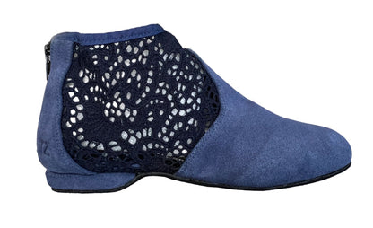 Blue shoe with perforated design on a white background