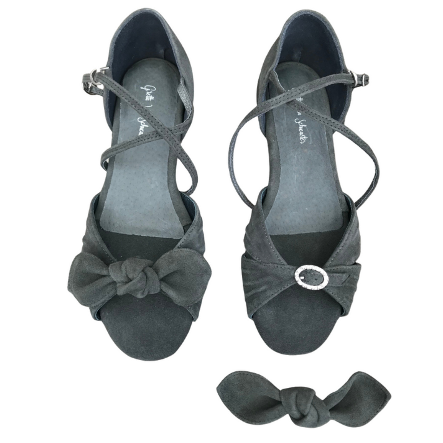 Pair of gray high-heeled shoes with bow details on a white background